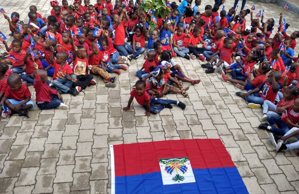 Celebración del Día de la Bandera y del Día de Profesor en la Escuela Maternal en Puerto Príncipe – Haití